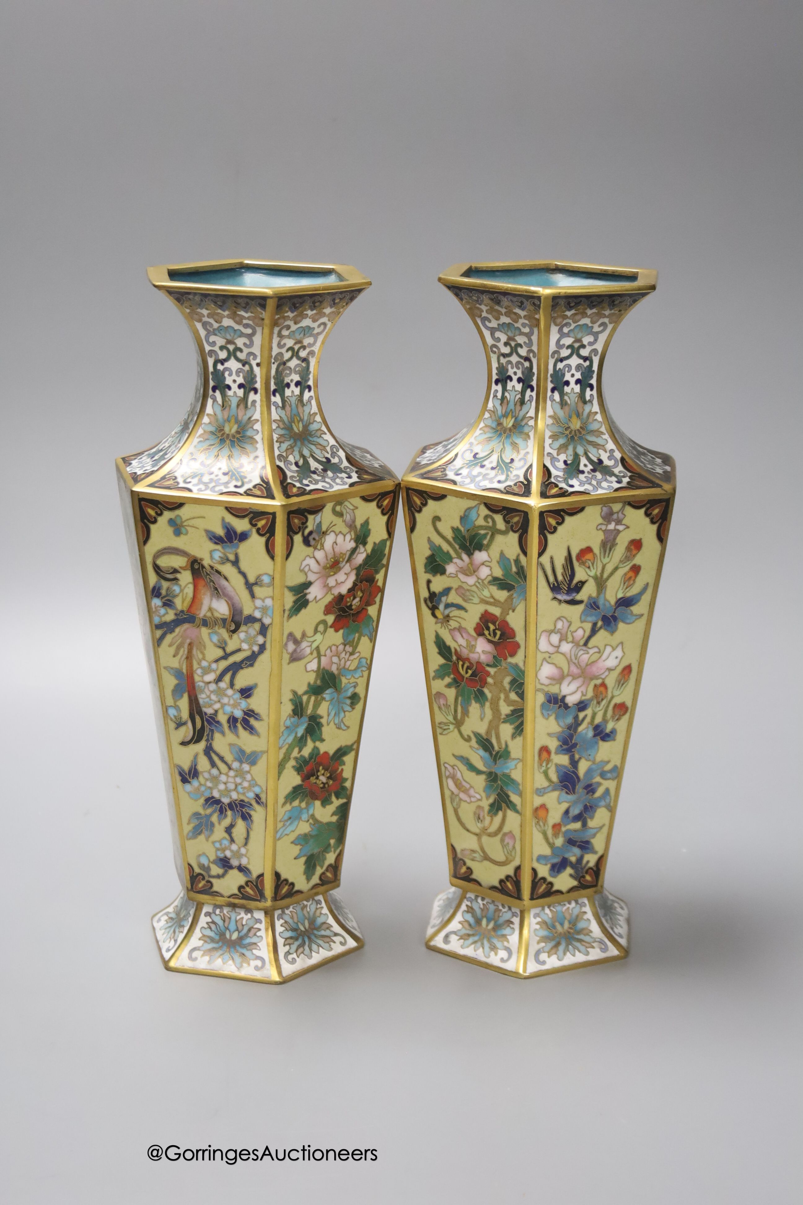 A pair of Chinese cloisonne enamelled hexagonal vases, 26cm